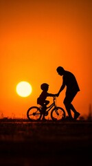 Obraz premium A beautiful silhouette of a parent guiding a child on a bicycle as the sun sets, symbolizing love, growth, and the joy of outdoor activities during golden hour.