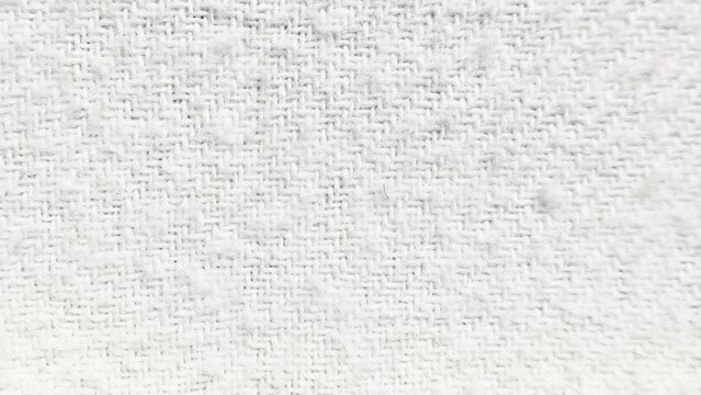 white linen fabric texture close-up with woven pattern and subtle natural imperfections