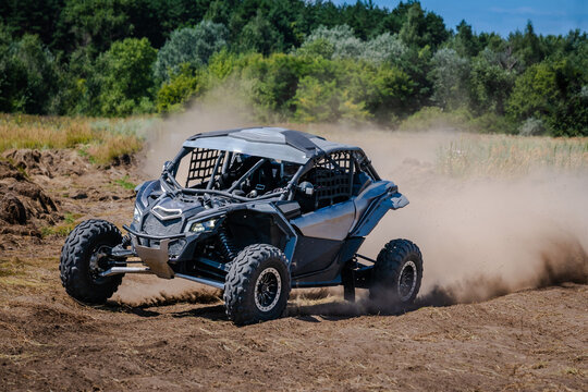 UTV buggy, rally or 4x4 in the action on sand