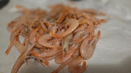Fresh shrimps piled on surface perfect for seafood cuisine and restaurant menu design