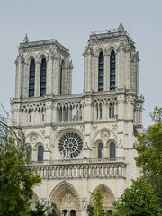 Beautiful view of Notre Dame Cathedral in Paris, showcasing its iconic Gothic architecture, historic facade, and stunning riverside setting