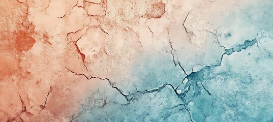 Abstract cracked surface with a gradient from peach to blue creating a textured background
