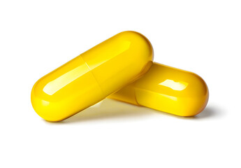 Close Up of Two Yellow Capsules Pills Medicine on White Background