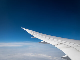 Dreamliner Window View of Antarctica’s Snowy Peaks, Glaciers, and Vast Ice Fields