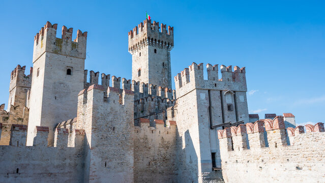 Scaliger Castle in Sirmione Italy with its crenellated stone walls and towers at Lake Garda