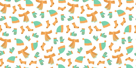 Winter clothing set. Seamless pattern. Knitted hat, scarf, mittens, and socks. Warm clothing collection. Hand-drawn flat illustration. Repeating vector background.