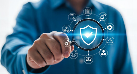Man holding a digital shield icon representing cybersecurity and data protection