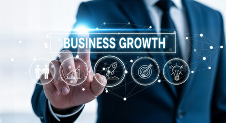 Professional interacting with a digital interface showing business growth concepts and innovation