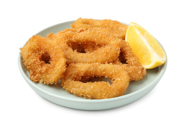Deep fried squid rings and lemon slice isolated on white