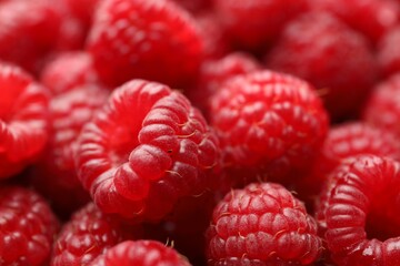 Fresh ripe raspberries as background, closeup view