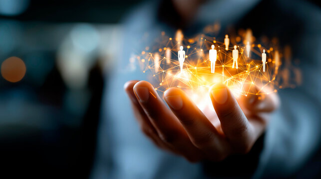 Individual holding illuminated digital representation of person connected to smaller figures faceless man defocused background networking connections symbolism human resources - Powered by Adobe