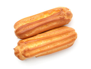 Tasty eclairs isolated on white, top view