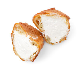 Halves of tasty profiterole with whipped cream isolated on white