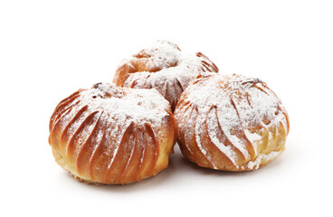 Tasty profiteroles with powdered sugar isolated on white