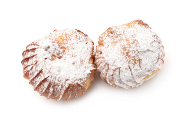Tasty profiteroles with powdered sugar isolated on white, top view