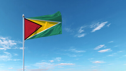 Sovereignty symbolized by the Guyanese flag waving proudly against a clear blue sky