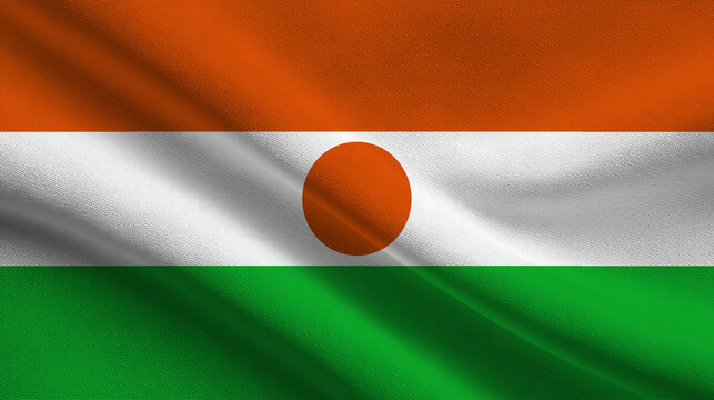 Flag of Niger waving in the breeze with vibrant colors representing national identity and pride