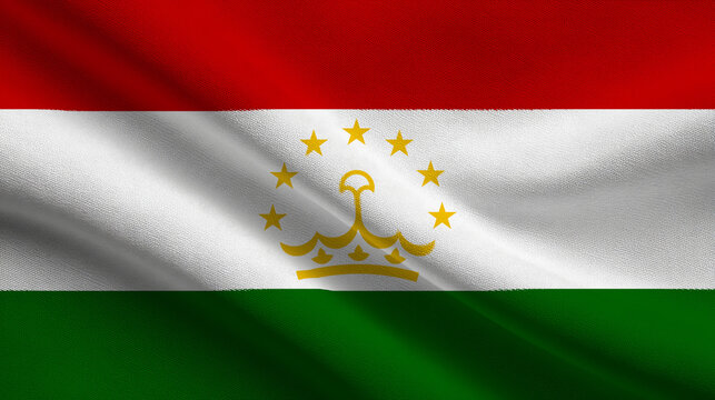 Sovereign flag of Tajikistan waving in the wind against a clear blue sky