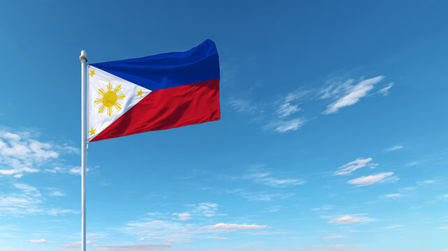 Philippine flag waving proudly on flag day under a clear blue sky with soft clouds - Powered by Adobe