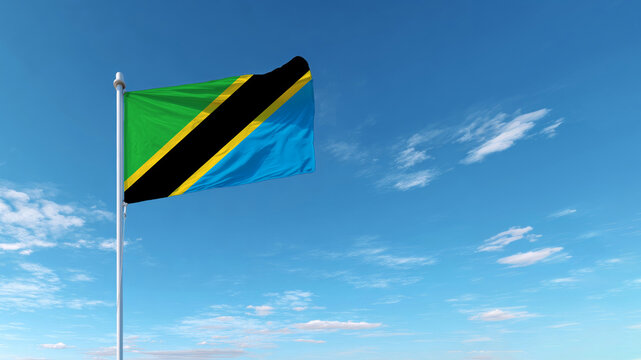 Waving flag of Tanzania under clear blue sky symbolizing independence and national pride - Powered by Adobe