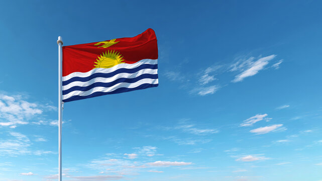 National flag of Kiribati waving proudly against a bright blue sky to symbolize independence and sovereignty