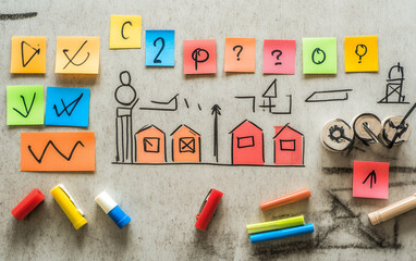 Assorted colorful sticky notes arranged on a board for planning and organization, symbolizing creativity and strategy