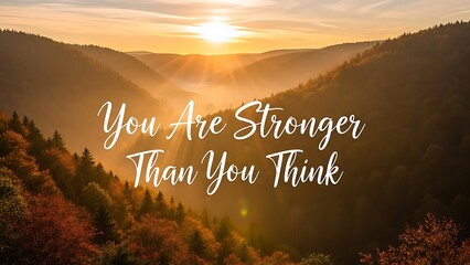 Inspirational quote over a scenic view of mountains during a golden sunset or sunrise