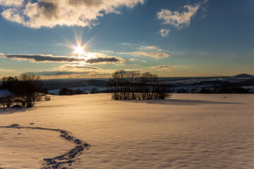 Footprints in Snow at Sunset, Scenic Winter Landscape in Rh&ouml;n, Germany