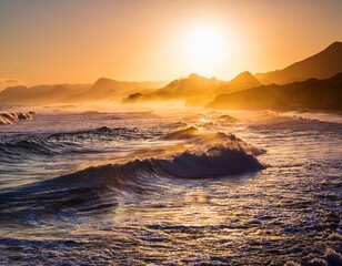 golden sunlight reflecting on powerful ocean waves at dawn with distant mountains and mist