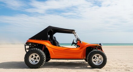 Vibrant orange dune buggy on sunny beach with clear blue sky