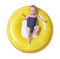 Cute little baby on inflatable ring against white background, top view