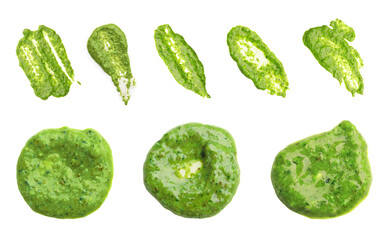 Set of fresh pesto sauce isolated on white, top view