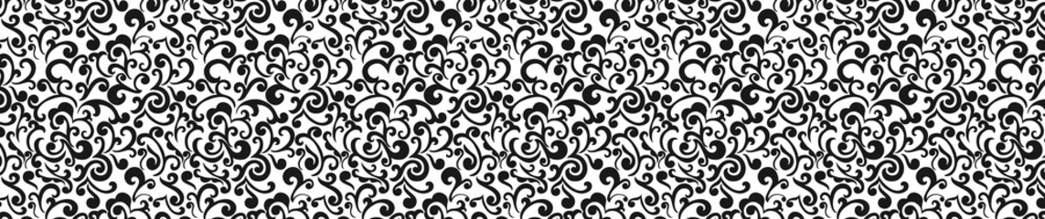 Seamless black ornamental floral pattern on white background with decorative swirl design