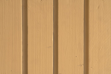 Close up detail of beige painted wooden wall texture with vertical planks suitable for abstract background or wallpaper design