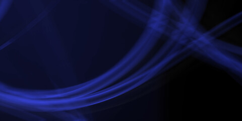 An abstract background with soft, blurred circular motions of blue light on a dark background. A concept of energy, a portal, or a mysterious glow.