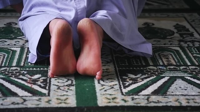 Prayer movements, prostration positions, and final tahiyat in prayer. Concept of Islamic religious footage, prayer education