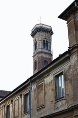 A lively scene from the city of Vercelli with bustling streets and a vibrant market. The image captures local life, architecture, and the authentic atmosphere of an Italian town.