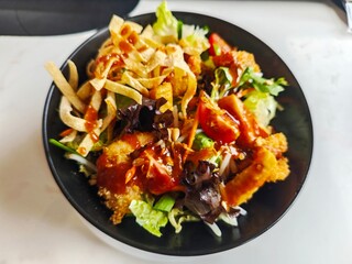 Fried shrimp on salad