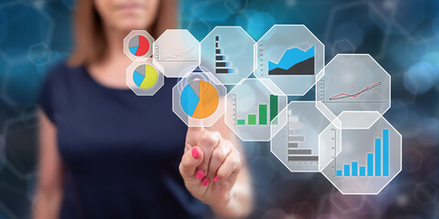 Woman touching a graphic analysis concept