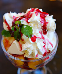 Raspberry and whipped cream dessert in glass bowl. High quality photo