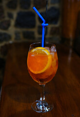 Glass of Aperol spritz cocktail isolated on white background. Top view. High quality photo