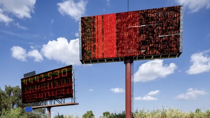 number data and code on overhead advertising signs