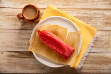 Sweet Tamale. hispanic dish typical of Mexico and some Latin American countries. Corn dough wrapped...