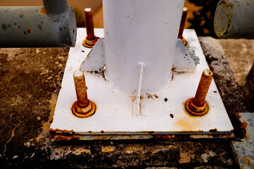 Rusty Sign Pole Socket with Corroded Bolts