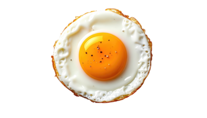 Overhead shot of a fried egg isolated against a black background. The yellow yolk is perfect, with pepper, surrounded by a white cooked ring
