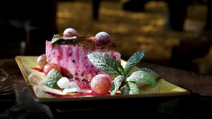 Pink dessert grapes cake showcase with different desserts pink cake grapes Tiramisu dark chocolate delicious appetizing large selection in restaurant against . High quality 4k footage