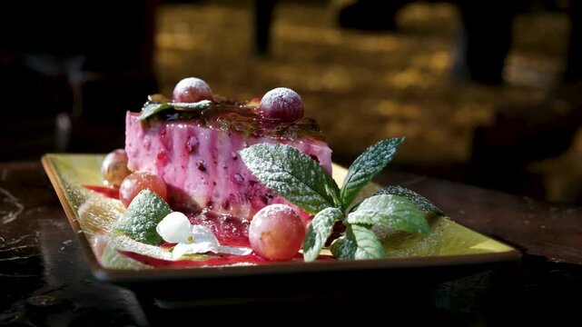 Pink dessert grapes cake showcase with different desserts pink cake grapes Tiramisu dark chocolate delicious appetizing large selection in restaurant against . High quality 4k footage