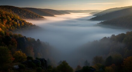 Breathtaking Autumn Landscape with Fog-Filled Valley at Dawn