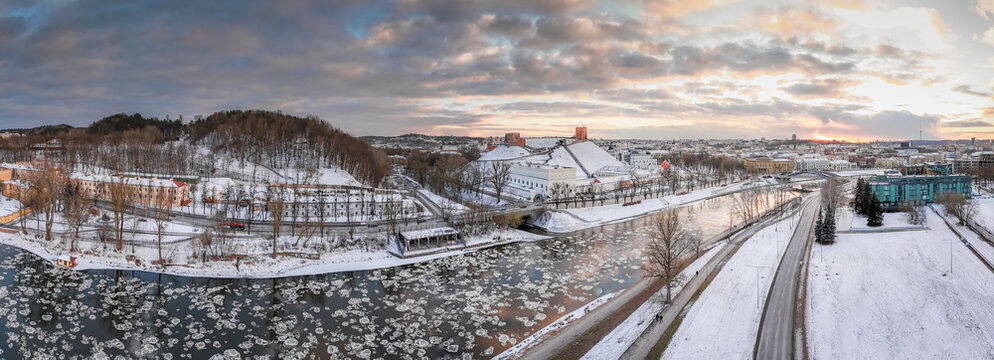 Aerial view of Neris River choked with ice floes reflects the muted dawn light near the Three Crosses Monument, Vilnius, Vilnius, Lithuania.