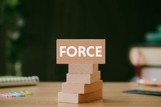 There is wood block with the word FORCE. It is as an eye-catching image.